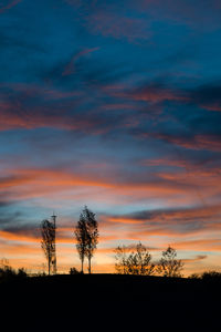 Silhouette tree against sky during sunset