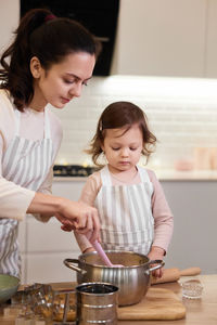 Mother and daughter at home
