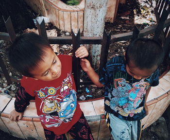 High angle view of people holding outdoors