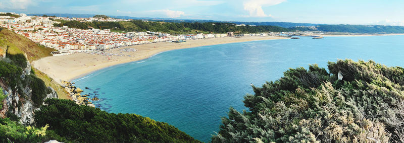 High angle view of bay against sky
