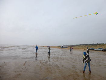 People enjoying at beach