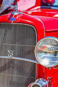 Close-up of red vintage car