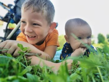 Close-up of cute boy playing in yard