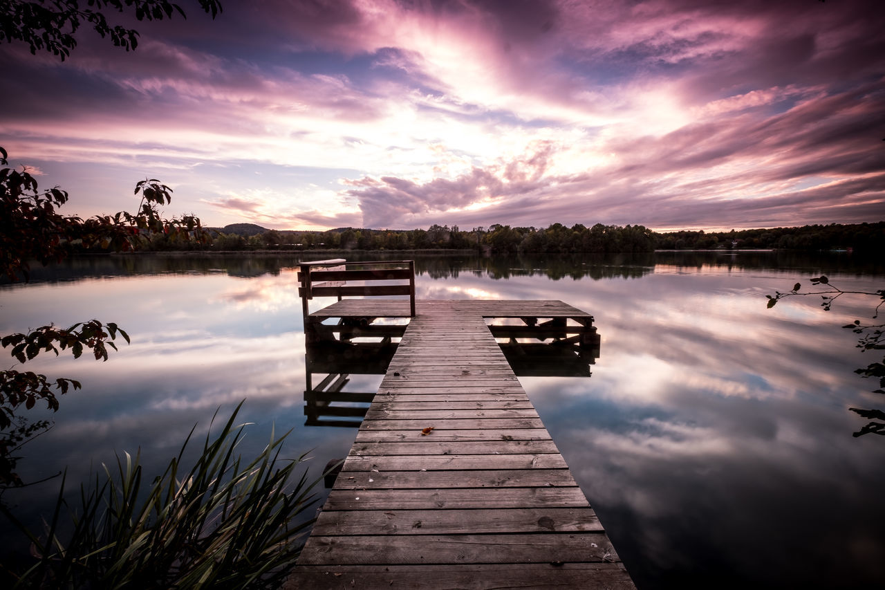 VIEW OF JETTY ON PIER AT SUNSET