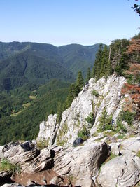 Scenic view of rocky mountains against clear sky