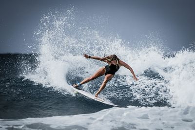 Man jumping in sea