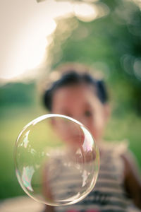 Close-up of bubbles in drinking glass