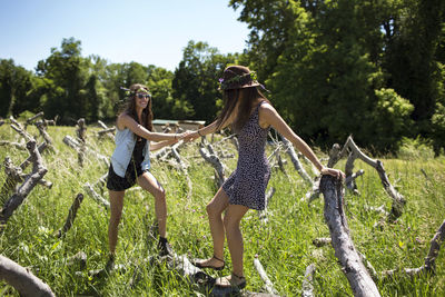 Playful friends enjoying in park