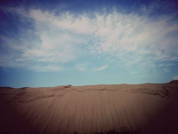 Scenic view of desert against sky