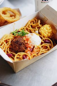 Close-up of noodles in plate on table