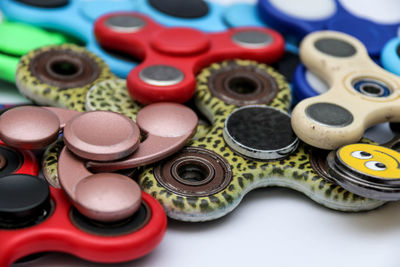 Close-up of fidget spinners on white background