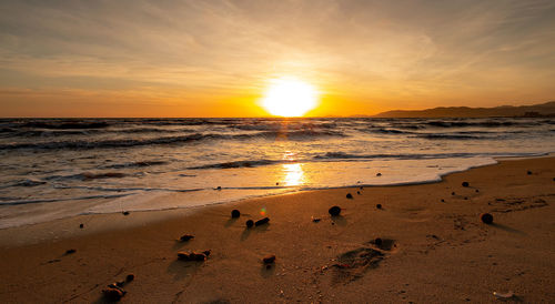 Scenic view of sea against sky during sunset