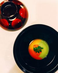 High angle view of tomatoes in bowl on table