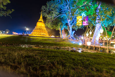 View of illuminated buildings at night