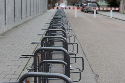 Empty bicycle parked on footpath