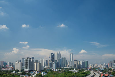 Modern cityscape against sky