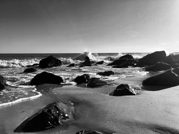 Scenic view of sea against clear sky