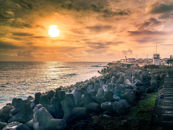 Scenic view of sea against sky during sunset