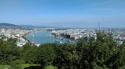 Cityscape against blue sky