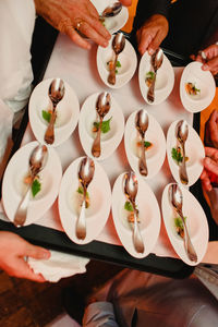 High angle view of people on table