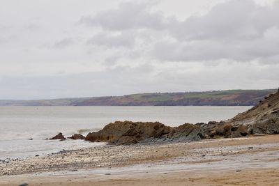 Scenic view of beach against sky