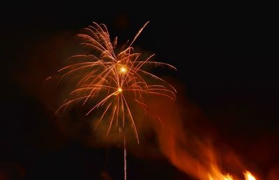 Low angle view of firework display