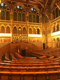 Interior of illuminated building at night