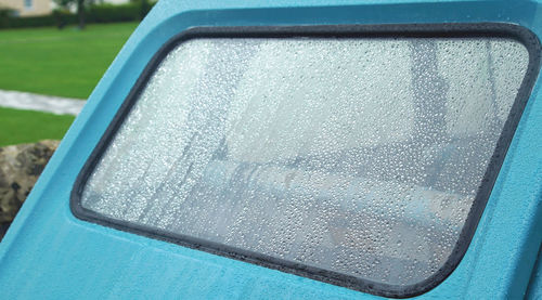 Close-up of wet car window