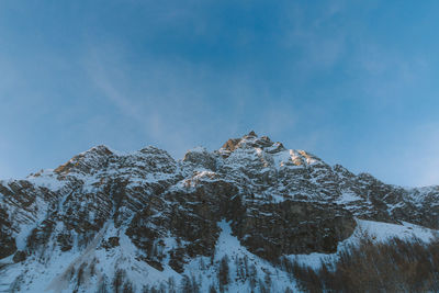 Scenic view of snowcapped mountain against sky