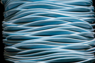 Full frame shot of stacked white plates