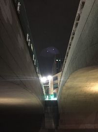 Low angle view of illuminated building at night