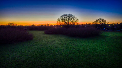 Scenic view of landscape against sky during sunset