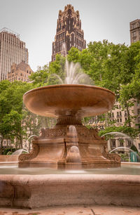 Fountain in front of building