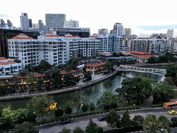 High angle view of street and buildings against sky