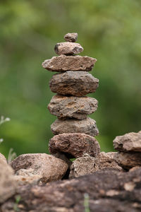 Close-up of stone stack on rock