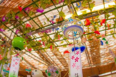 Low angle view of carousel in amusement park