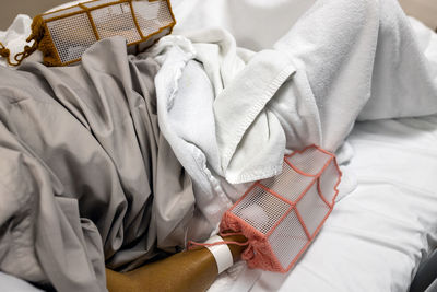 High angle view of mannequin on bed at home