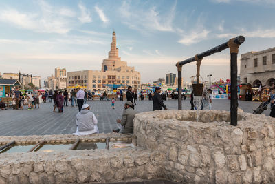 Group of people in front of historical building