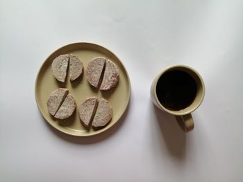 High angle view of coffee cup on table