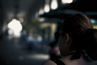 Rear view of woman looking at city