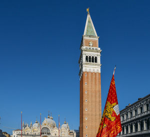 Low angle view of building against blue sky