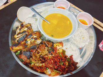 High angle view of meal served on table