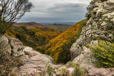 Scenic view of rocky mountains against sky