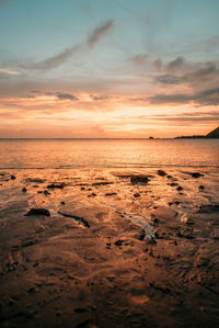 Scenic view of sea against sky during sunset