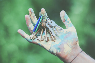 Close-up of keys in hand