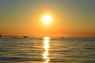 Scenic view of sea against sky during sunset