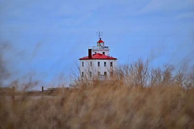 Low angle view of lighthouse against sky