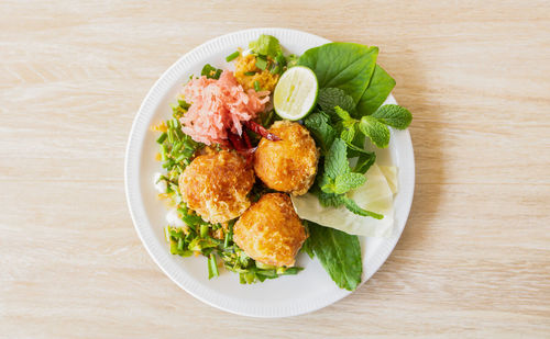 High angle view of salad in plate on table