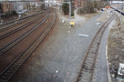 High angle view of train on railway tracks in city