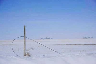 Scenic view of landscape against blue sky